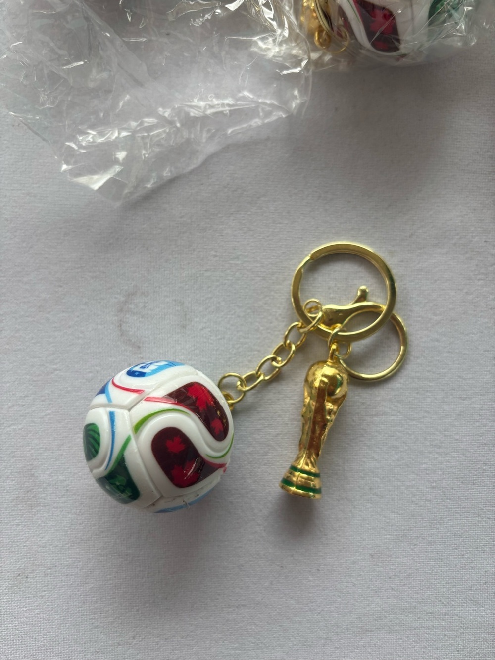 Soccer Ball & Gold World Trophy Keychain - White, Red, Green, Blue, Gold